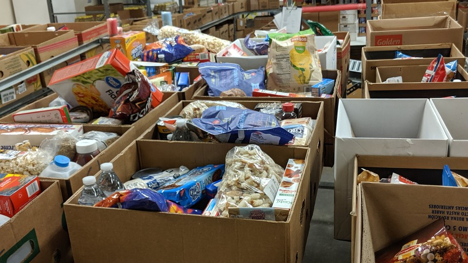 Boxes of food awaiting distribution from 'God's Storehouse' in Danville, Virginia