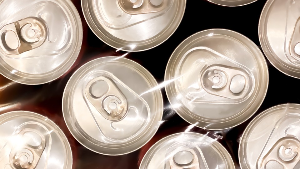 Overhead image of multiple aluminum soda cans