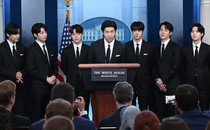 V, Jungkook, Jimin, RM, Jin, J-Hope, and Suga in the White House press briefing room
