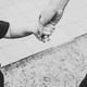 A parent and child holding hands