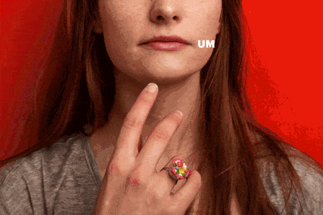 A person raises a finger to their chin as the word "Um" appears across the photo.