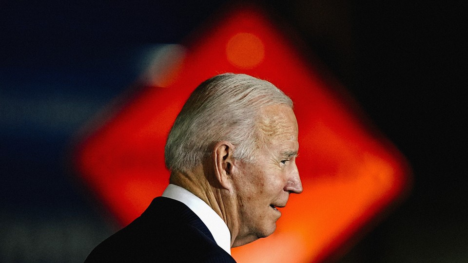 President Joe Biden appears in profile.