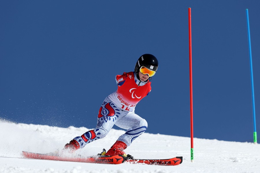 A skier makes a turn during a slalom race.