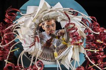 Photo of a person working on a complex motor