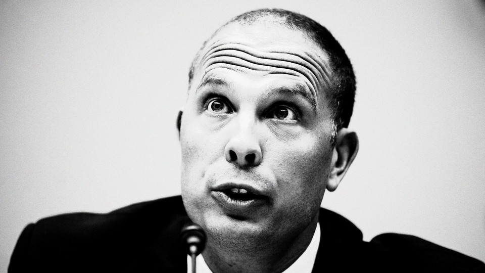 A black-and-white photograph of former military-intelligence officer David Grusch during his testimony to Congress