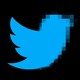 Illustration of Twitter bird fading into pixels on black