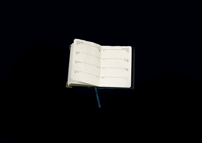 A diary on a black background