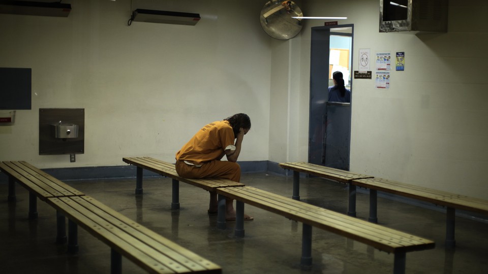 An unidentified inmate sits in a facility in Santa Ana, California.