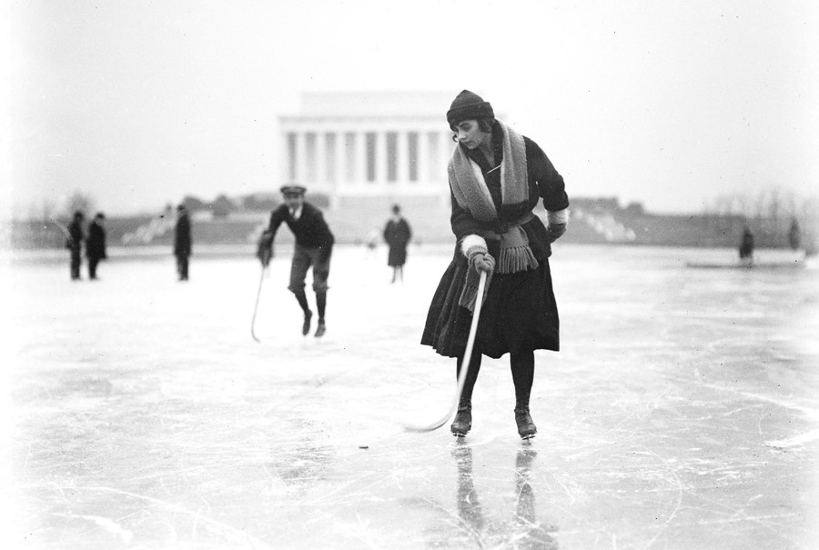 People ice skate in front of the Lincoln Memorial