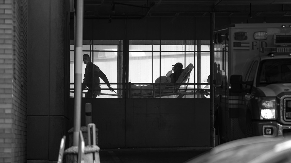 Emergency medics at Elmhurst Hospital Center in New York City.