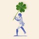 A New York Yankee swinging a giant four-leaf clover