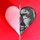 An illustration of a paper heart with Donald Trump's face filling in half of the heart icon