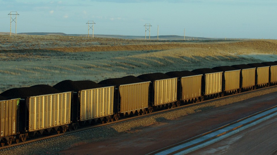 Freight cars of coal depart Wyoming in this 2006 file photo