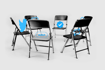 Twitter icons and buttons on folding chairs in a circle.