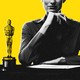 A person sitting next to an Oscar