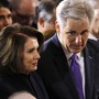 House leaders Nancy Pelosi and Kevin McCarthy speak to one another.