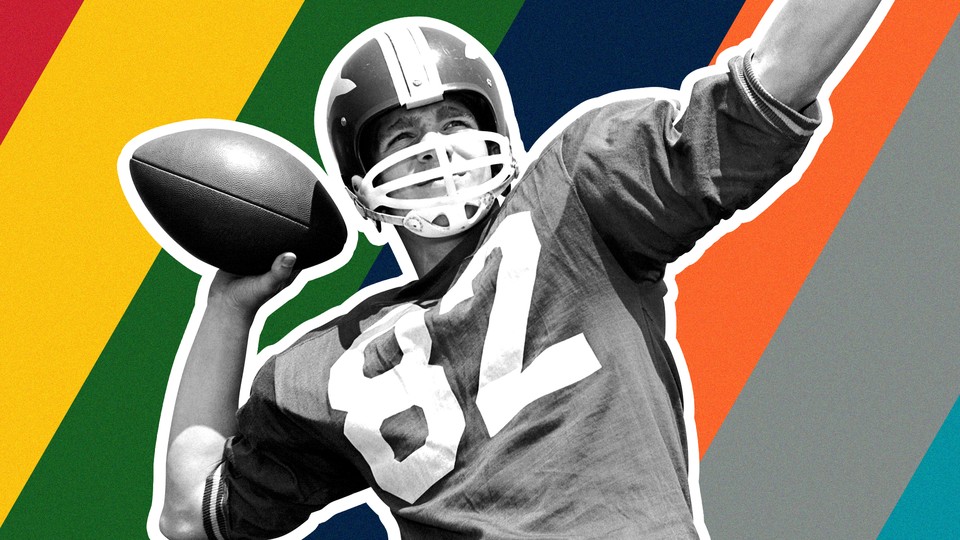 A quarterback gets ready to throw a football