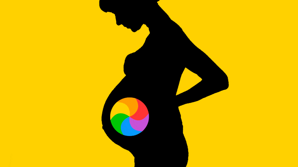A silhouette of a pregnant woman on a yellow background. A rainbow Mac loading cursor spins over her belly.