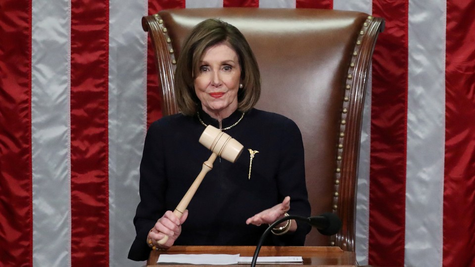 Nancy Pelosi holding a gavel