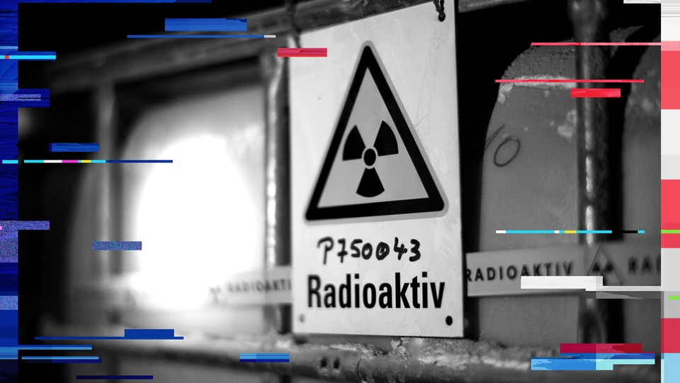 A radiation sign is attached to a barrel containing radioactive water at the Asse nuclear waste disposal centre in a unused mine near the German village of Remlingen