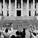A black-and-white photograph of abortion-rights supporters protesting outside the Kansas statehouse in Topeka