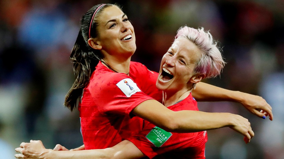 Alex Morgan (<i>left</i>) and Megan Rapinoe celebrate a goal during the World Cup match on Tuesday.