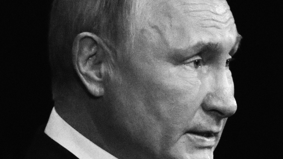 Black-and-white, close-up shot of Vladimir Putin looking resolute in profile