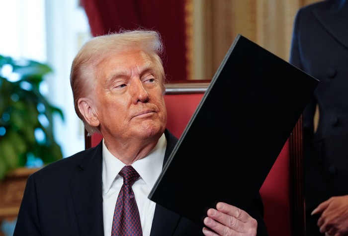 Donald Trump holds an executive order