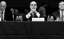 Henry Paulson, Ben Bernanke, and Christopher Cox sit before the Senate banking committee in September 2008