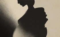 A pregnant person's silhouette