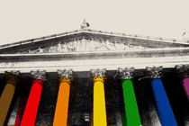 An illustration of the Supreme Court with rainbow colored columns.