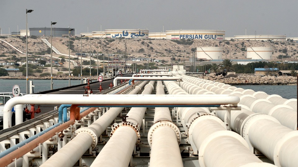 A photograph of the Port of Kharg Island Oil Terminal near the Iranian coast in the Persian Gulf