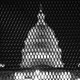 The Capitol building behind a fence