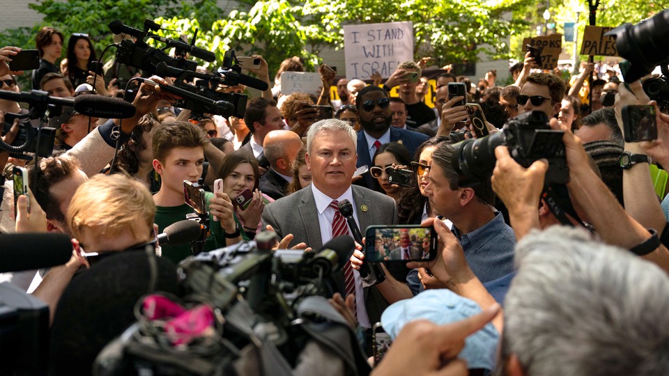 Representative James Comer surrounded by onlookers at GWU