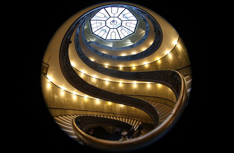 The spiral staircase in the Vatican museum on March 16, 2017 in Vatican City, Vatican, photographed with a fisheye lens