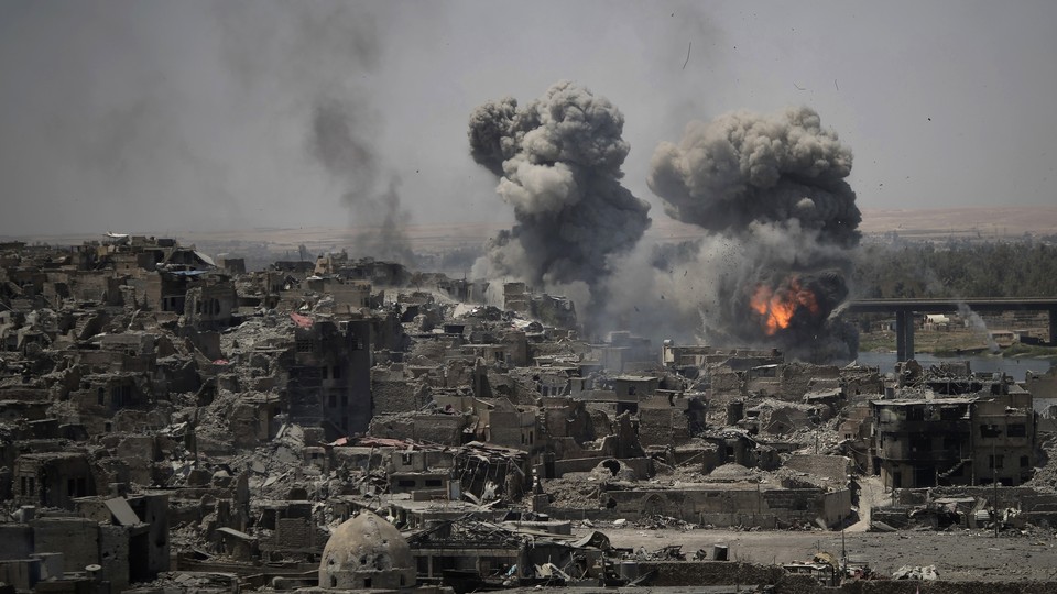 Airstrikes target ISIS positions on the edge of the Old City on July 11, 2017. 