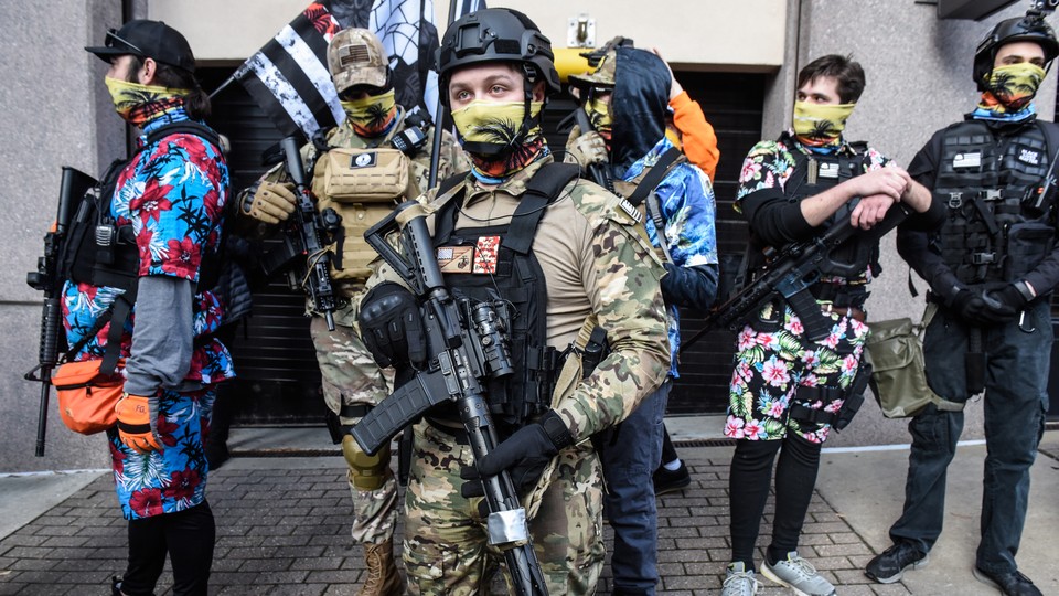 Members of a pro-gun group called the Last Sons of Liberty stand with their weapons near the state Capitol on January 18, 2021 in Richmond, Virginia. Capitol Square in Richmond has been closed until January 21, in anticipation of possible unrest after the riots at the U.S. Capitol on January 6th.