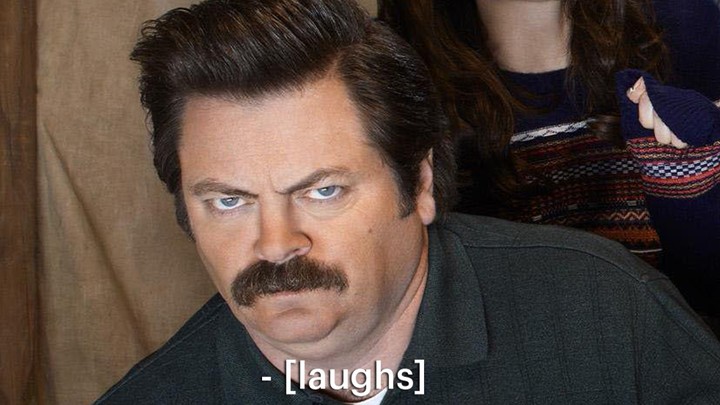 The actor Nick Offerman stares angrily at the camera, with a caption say that says "Laughs."