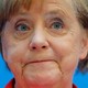 A close-up of Angela Merkel frowning