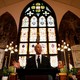 Cory Booker stands in front of a church tabernacle while speaking at the Mother Emanuel church in South Carolina.