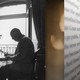 A photo collage of Nabokov and a book