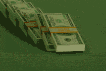 An animated illustration of stacks of dollar bills standing up like falling dominoes in reverse.