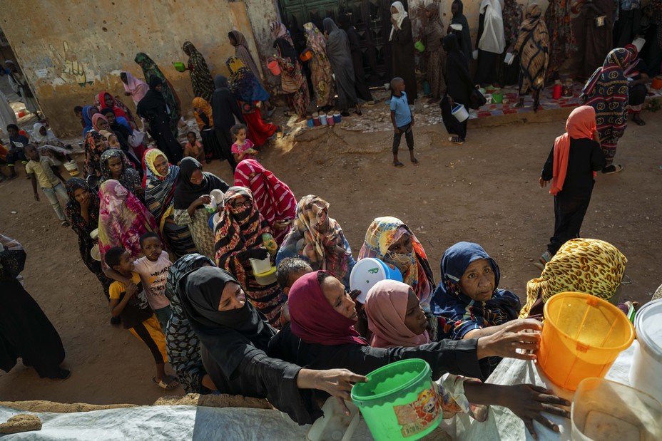 A lot of families line up for food and aid
