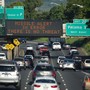 sign on a highway in Honolulu clarifies that the emergency nuclear missile alert was a false alarm. 