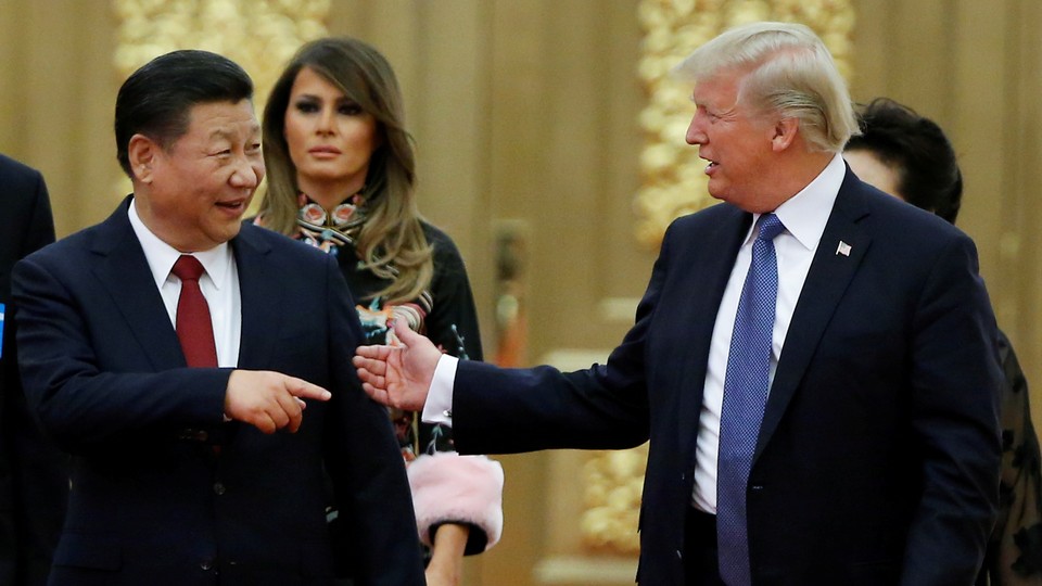 Trump and Xi meet in Beijing in 2017.