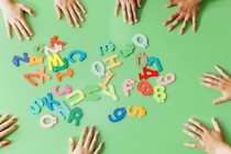 Photo of letters, kids' hands