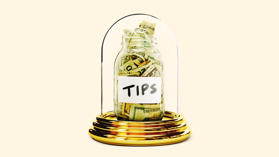 Tip jar under a glass cloche