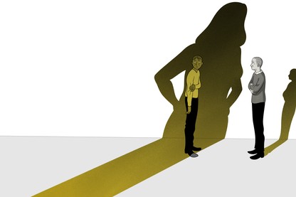 The large, elongated shadow of a woman falls on a nervous-looking man who is speaking to another man