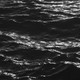 Black-and-white photograph of waves