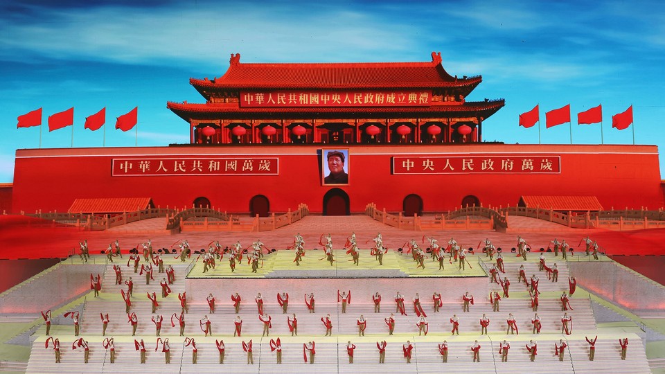 Actors practice commemoration ceremonies in front of Beijing's Forbidden City.